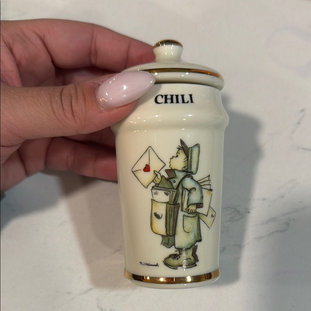 Vintage 1987 M.J. Hummel porcelain "Chili" spice jar.